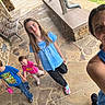 Amberlyn joined the competition — help win amazing prizes! woman, child, children, selfie, outdoor, stone_path, bench, casual_clothing, smile, holding_hands, family, blue_shirt, pink_shirt, jeans, sneakers, crocs, stone_wall, daylight, happy, nature