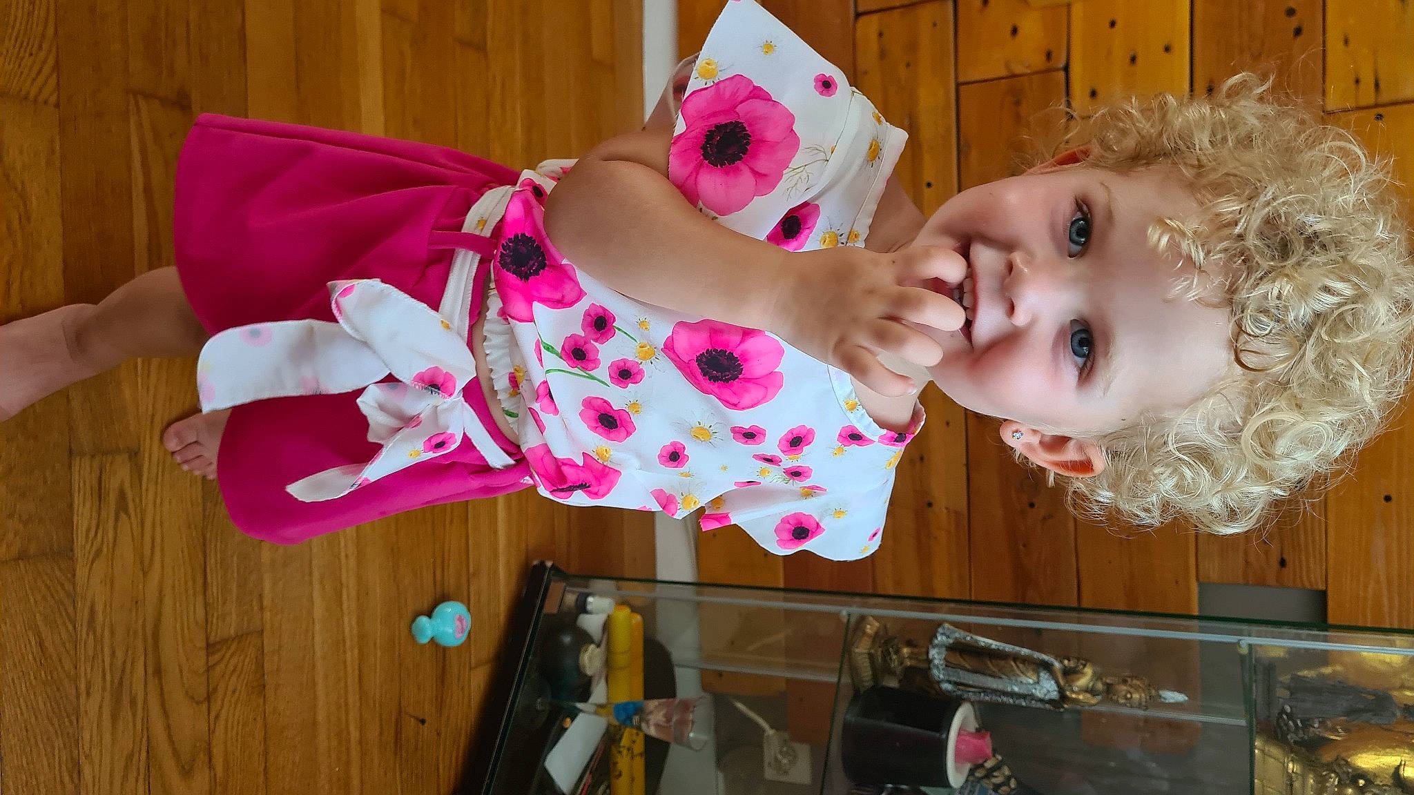 Inaya participe au concours pour gagner de l'argent avec cette photo : baby, baby_products, baby_toddler_clothing, cheek, child, drawer, dress, eyelash, fun, happy, head, human_body, magenta, pattern, person, pink, room, skin, smile, toddler