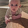 baby, infant, face, wood, mountains, landscape, nature, outdoor, curious, wide_eyes, skin, hand, clothing, texture, light, shadow, background, young_child, expression, portrait