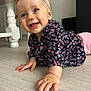baby, blue_eyes, child, clothing, crawling, cute, floor, furniture, happy, headband, home, indoor, infant, long_sleeves, person, pink, portrait, smiling, wooden_floor, young_child