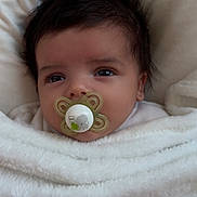 Gianni participe au concours pour gagner de l'argent avec cette photo : baby, blanket, child, comfort, cozy, cuddle, cute, face, indoors, infant, newborn, pacifier, peaceful, portrait, resting, sleepy, soft, warm, wrapped, young