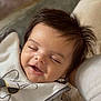 Gianni a rejoint le concours — aidez-le/la à gagner de superbes lots ! baby, bib, child, closeup, clothing, comfort, cute, face, hair, happy, indoors, infant, peaceful, person, portrait, resting, sleeping, smiling, soft, texture