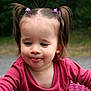 Neïla a rejoint le concours — aidez-le/la à gagner de superbes lots ! casual_clothing, child, cute, face, girl, green_background, hair, hair_ties, happy, maroon_shirt, outdoor, person, pigtails, pink_chair, portrait, sitting, smiling, toddler, tongue_out, young_child