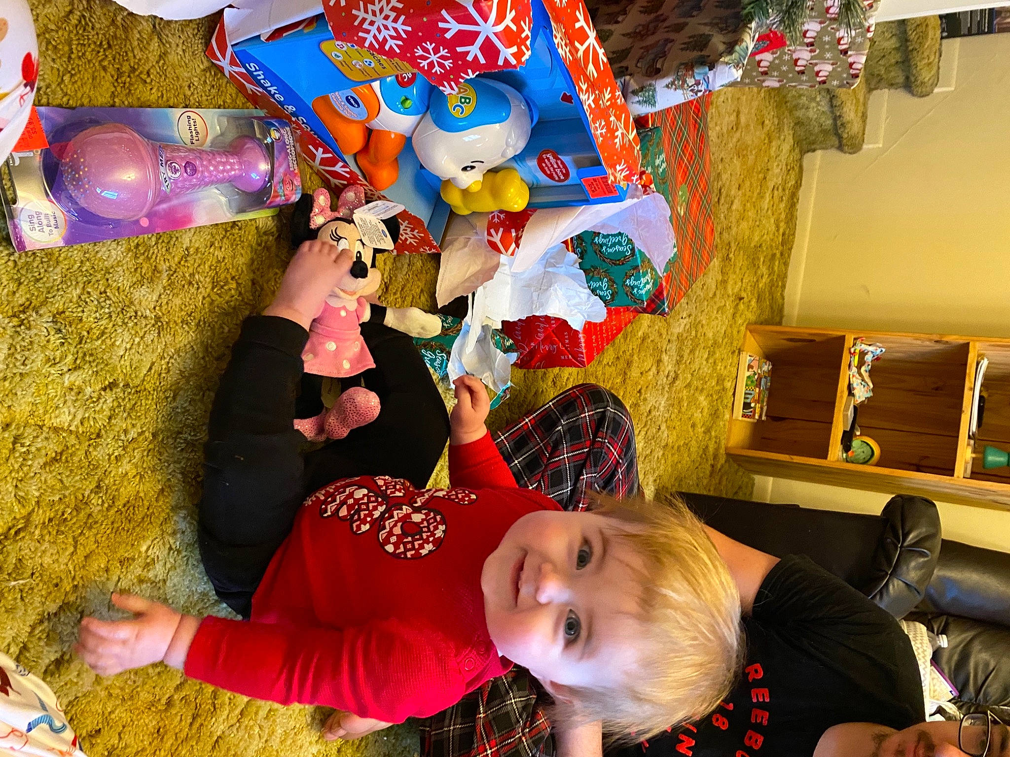 Allison is registered to the contest to win money with this photo: child, event, fictional_character, fun, happy, holiday, joy, leisure, party_supply, people, person, plastic, play, room, smile, snapshot, stuffed_toy, toddler, tree, visual_arts