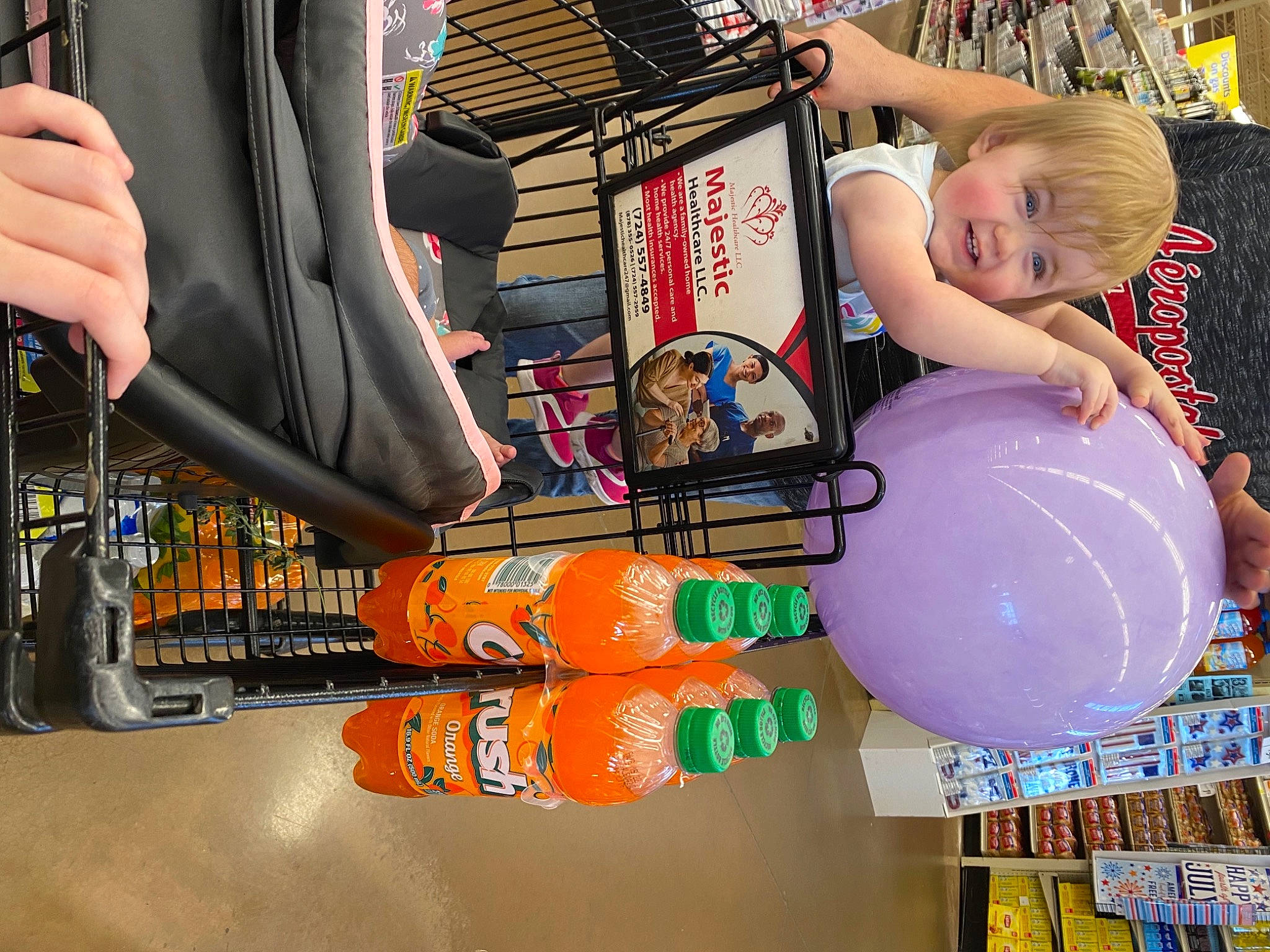 Allison is registered to the contest to win money with this photo: bag, balloon, customer, fashion, fashion_accessory, fun, helmet, human_leg, leisure, luggage_and_bags, party_supply, person, recreation, retail, shelf, shopping, t_shirt, textile, thigh, toddler