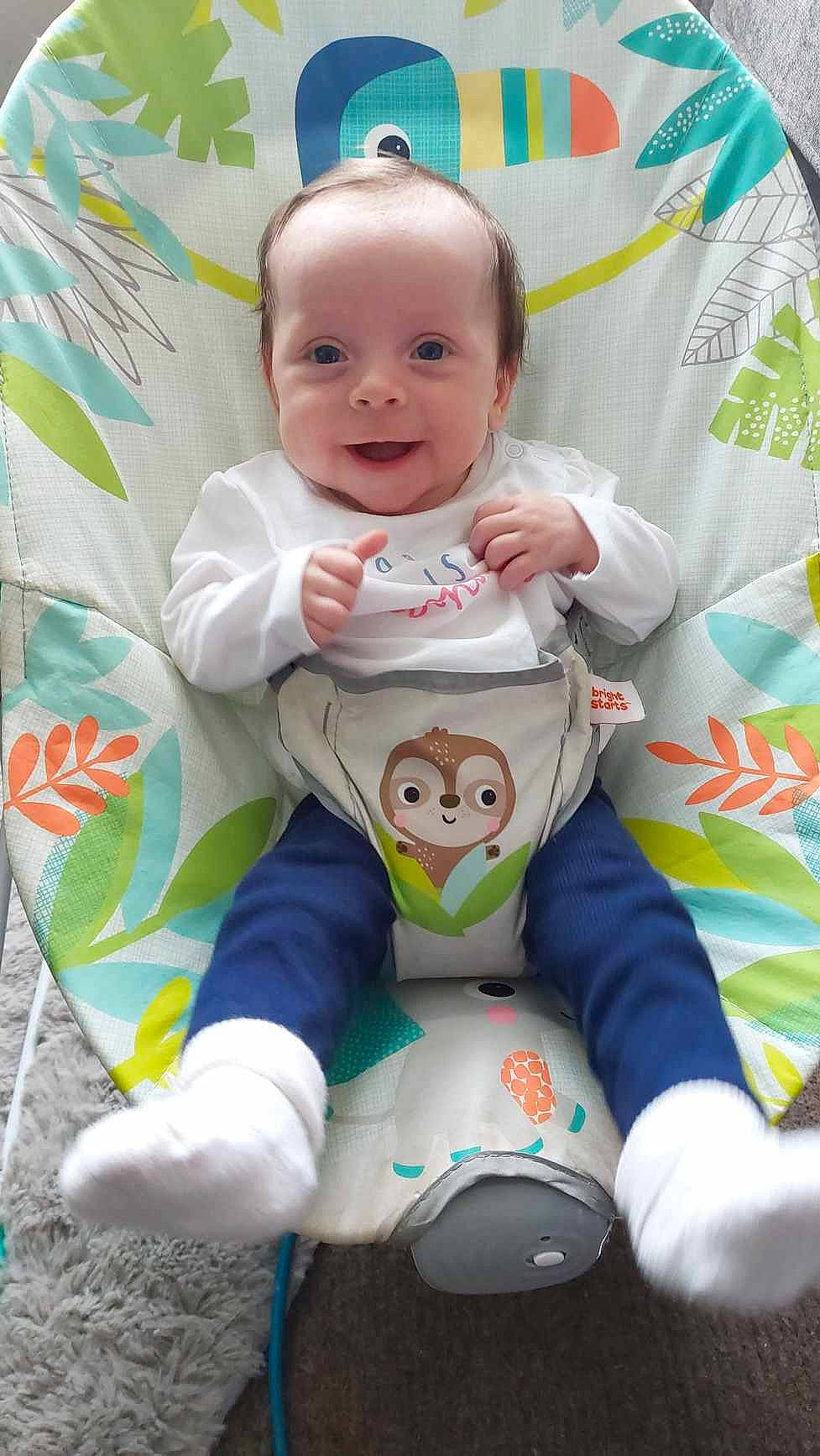 Lana is registered to the contest to win money with this photo: baby, baby_products, baby_toddler_clothing, cheek, child, eye, facial_expression, fun, grass, happy, mammal, person, pink, product, skin, sleeve, smile, textile, toddler, vertebrate