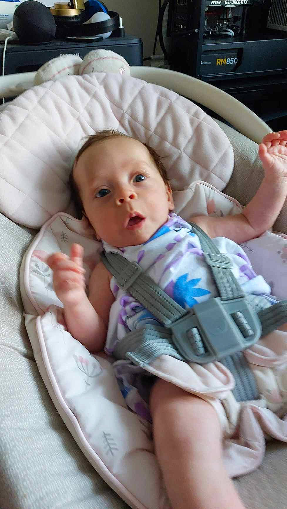 Lana is registered to the contest to win money with this photo: baby, baby_carriage, baby_in_car_seat, baby_products, baby_safety, baby_toddler_clothing, car_seat, cheek, child, comfort, facial_expression, hairstyle, knee, mouth, person, product, sitting, skin, thigh, thumb