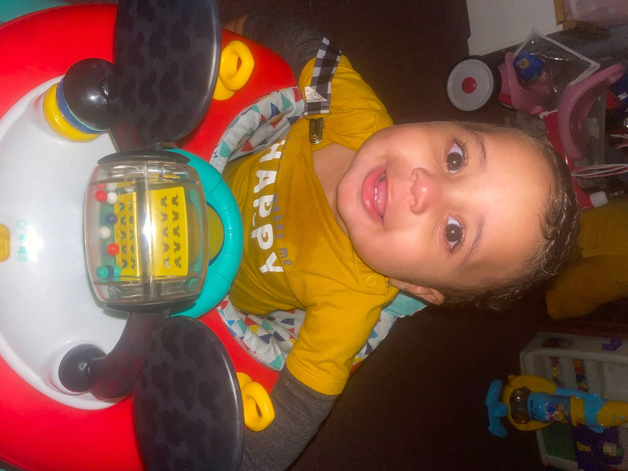Braiden is registered to the contest to win money with this photo: baby, baby_products, baby_toddler_clothing, baby_toys, cheek, child, fun, happy, leisure, orange, party, person, personal_protective_equipment, plastic, play, room, sitting, smile, toddler