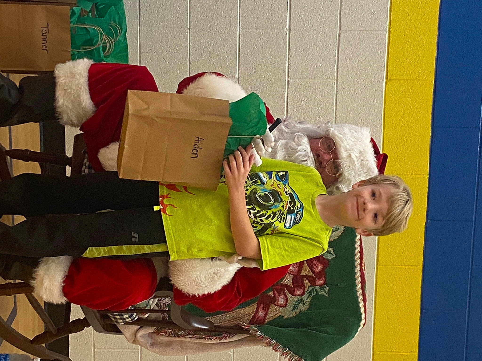 Aiden joined the competition — help win amazing prizes! carmine, child, event, happy, holiday, joy, person, room, smile, sock, textile, toddler, yellow