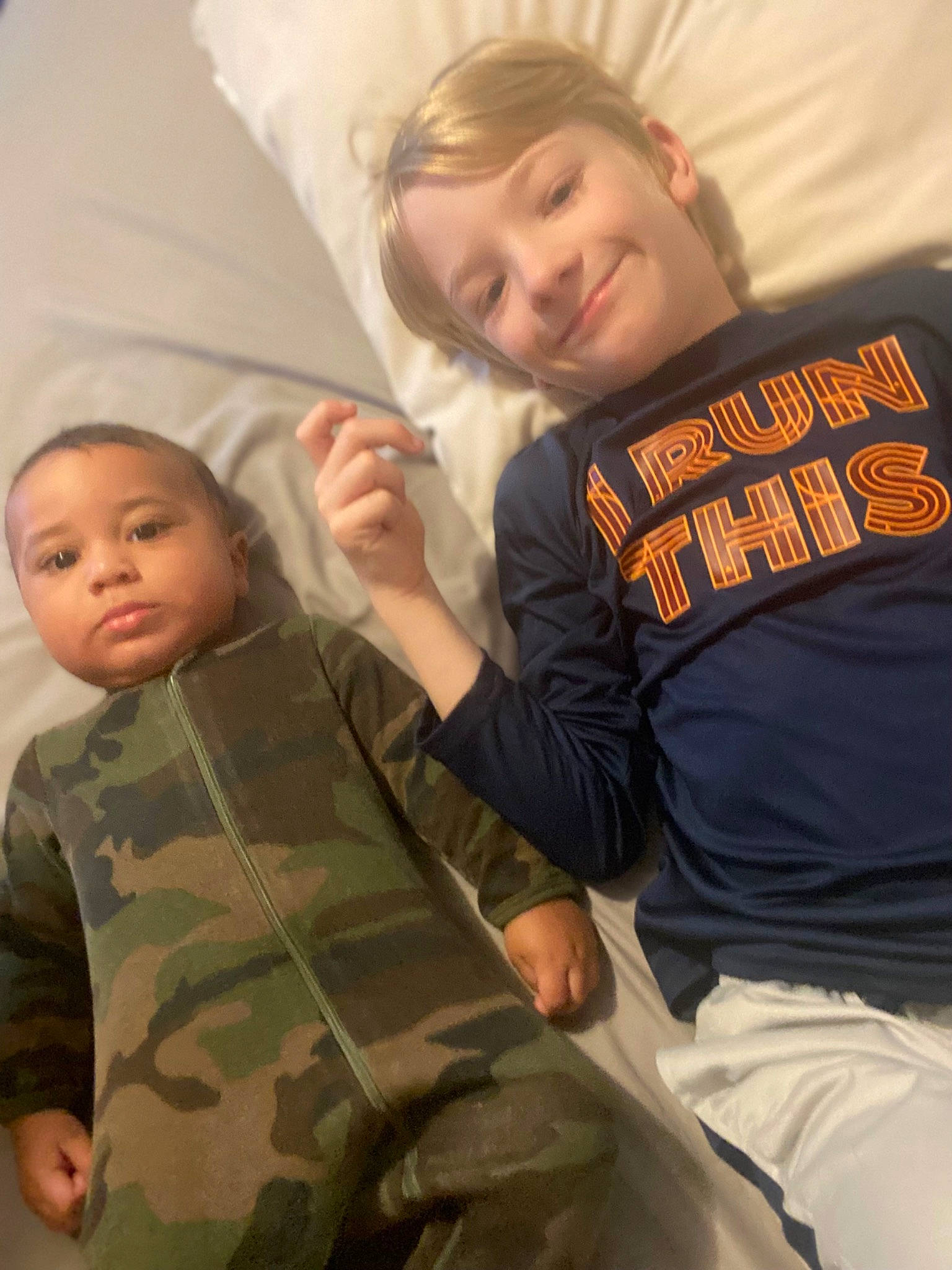 Aiden joined the competition — help win amazing prizes! arm, baby_toddler_clothing, camouflage, clothing, comfort, eye, face, finger, gesture, happy, head, joint, joy, military_camouflage, person, skin, sleeve, smile, t_shirt, textile