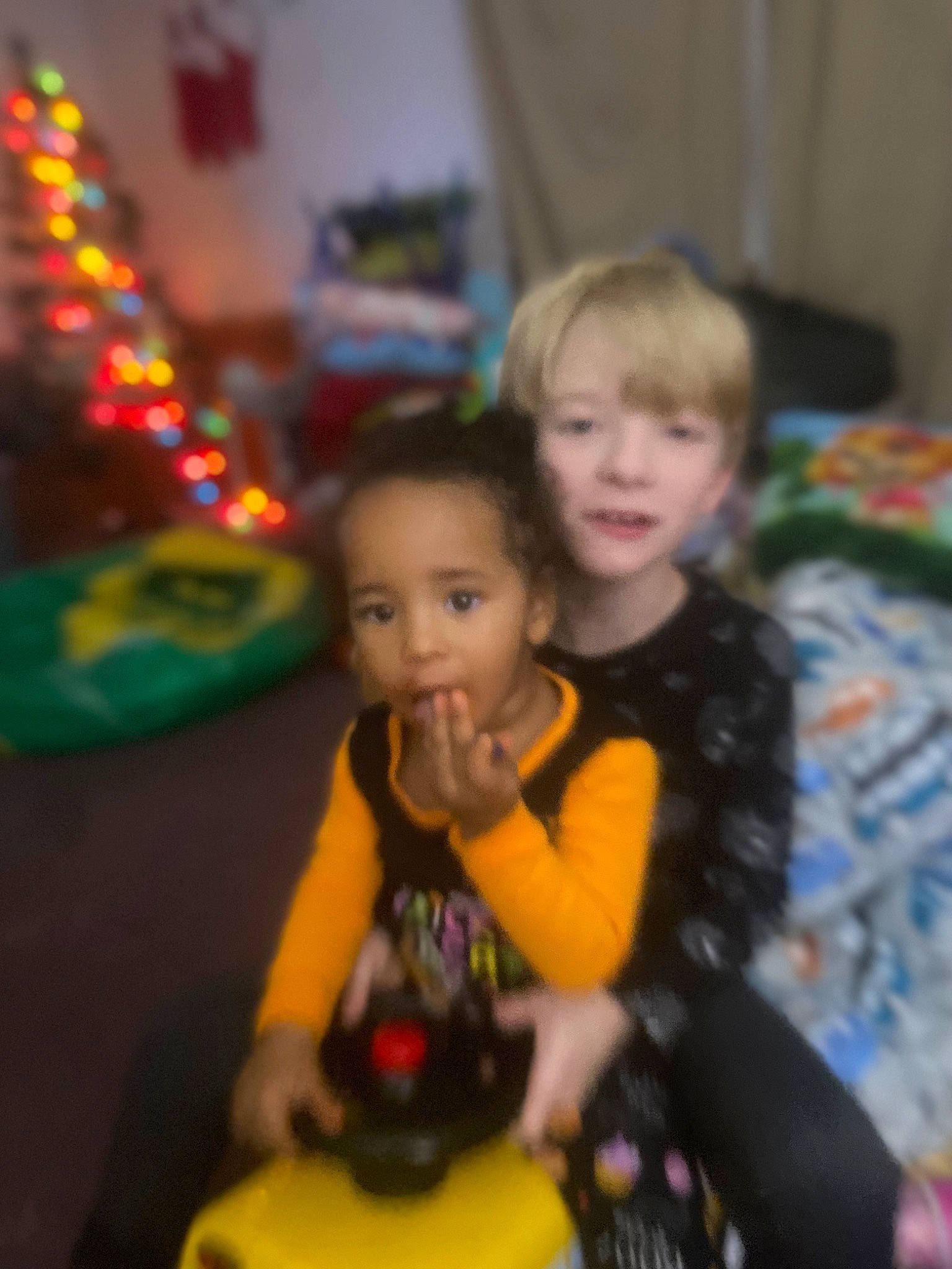 Aubree is registered to the contest to win money with this photo: baby, child, event, eye, face, fun, hair, happy, holiday, iris, lap, leisure, person, recreation, riding_toy, room, sitting, smile, standing, toddler