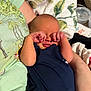 Greyson is registered to the contest to win money with this photo: newborn, baby, infant, onesie, arms, blanket, person, sleepy, hand, face, skin, clothing, indoor, comfort, resting, cute, toddler, holding, young_child, casual