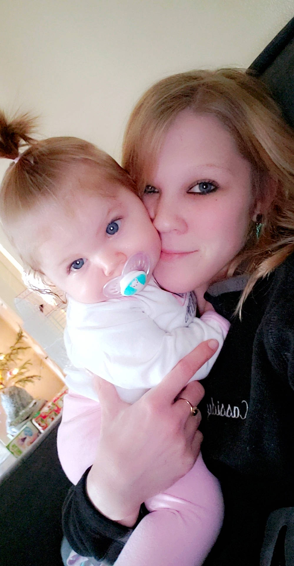 Phoebe is registered to the contest to win money with this photo: baby, brown_hair, cheek, child, daughter, eye, gesture, happy, hug, interaction, iris, mother, person, skin, smile, toddler