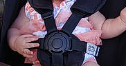 Sylvia joined the competition — help win amazing prizes! baby, child, smiling, blue_eyes, stroller, safety_harness, blanket, teddy_bear, cute, infant, clothing, outdoor, happy, person, seat, hand, legs, fabric, toy, closeup