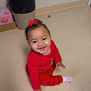 Summer joined the competition — help win amazing prizes! toddler, child, smiling, red_clothing, bow, sitting, floor, indoors, happy, person, baby, plaid_pants, sock, trash_can, box, hair, cute, portrait, young_child, playful
