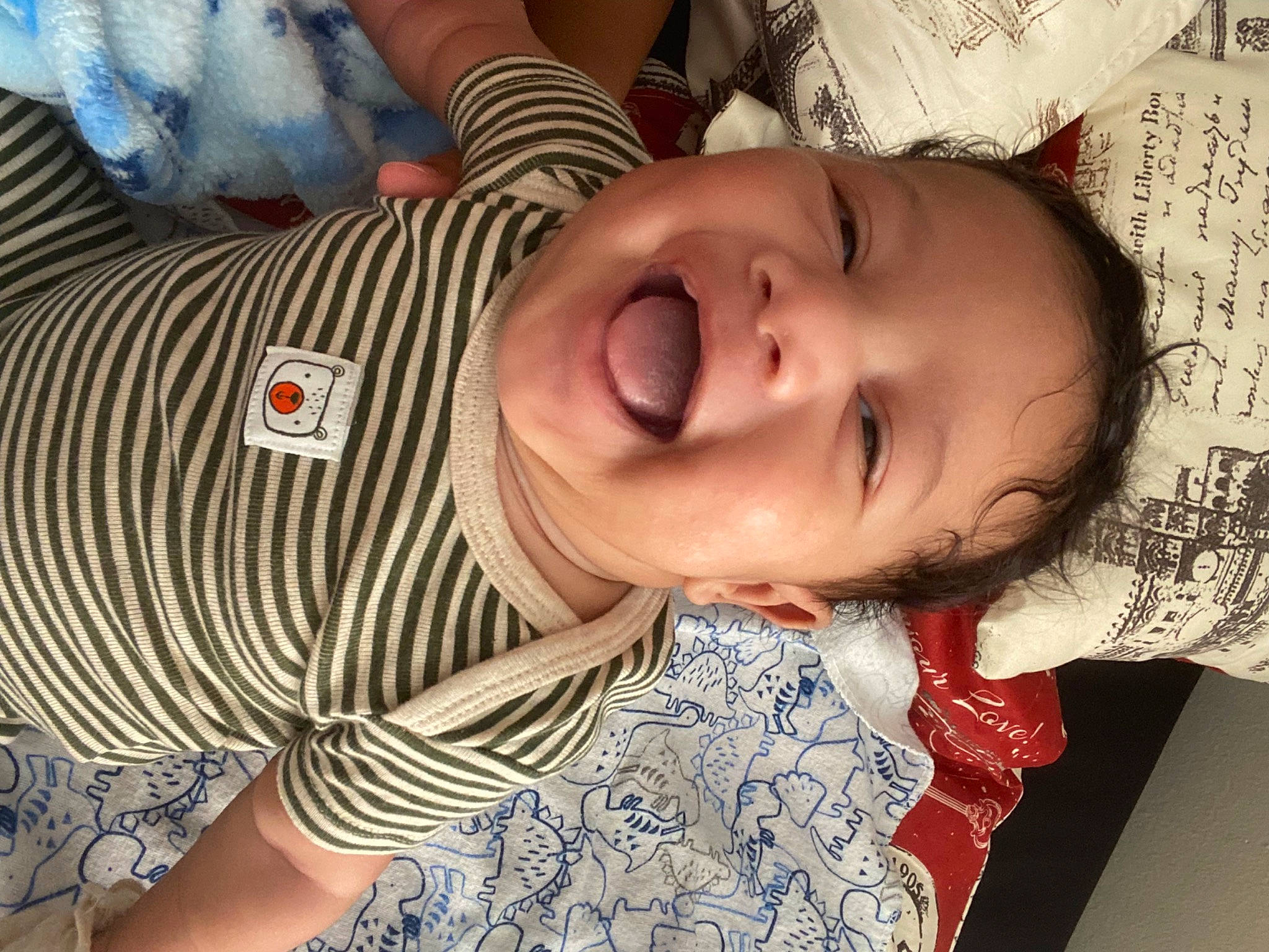 Joaquin is registered to the contest to win money with this photo: baby, baby_toddler_clothing, cheek, child, chin, eye, eyebrow, eyelash, finger, happy, iris, lip, mammal, mouth, nose, organ, person, skin, sleeve, smile