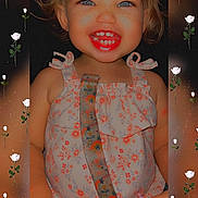 Atlas is registered to the contest to win money with this photo: toddler, child, smiling, blue_eyes, freckles, dress, floral_pattern, rainbow_strap, portrait, happy, cute, face, person, young_child, indoors, colorful, fashion, baby, closeup, flower_frame