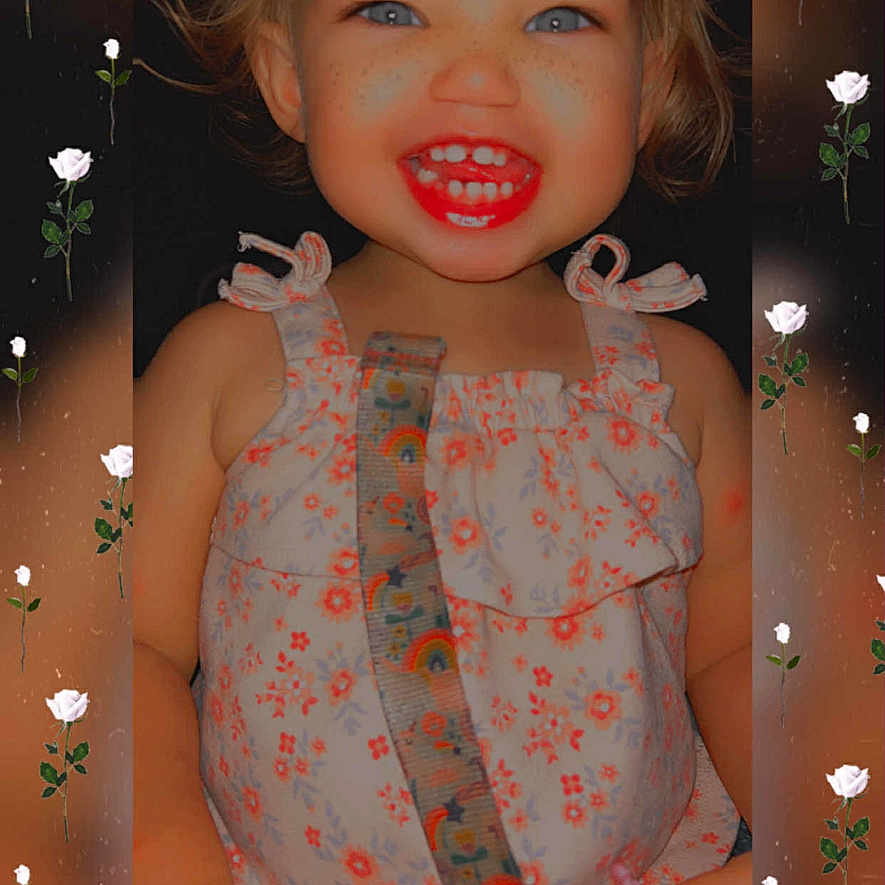 Atlas is registered to the contest to win money with this photo: baby, blue_eyes, child, closeup, colorful, cute, dress, face, fashion, floral_pattern, flower_frame, freckles, happy, indoors, person, portrait, rainbow_strap, smiling, toddler, young_child