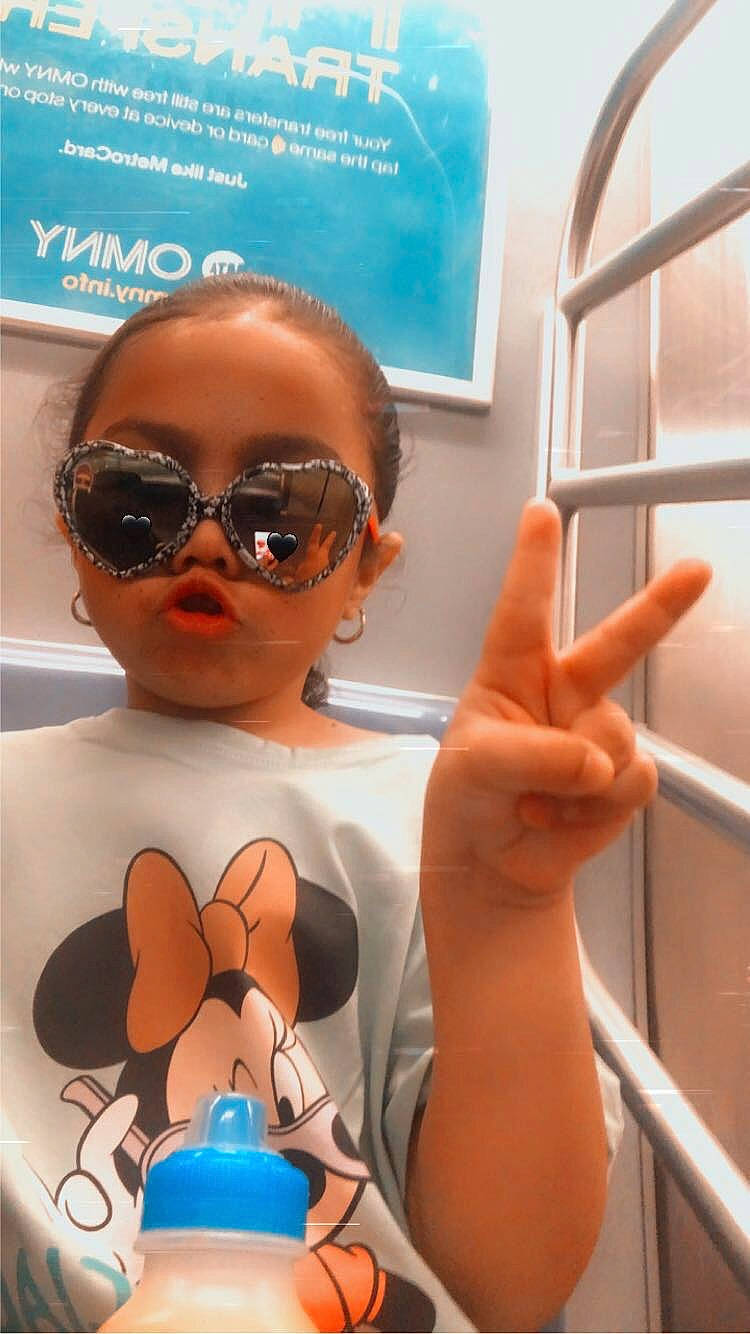 Luna is registered to the contest to win money with this photo: blue, chest, child, cool, eyelash, eyewear, fashion_accessory, fashion_design, gesture, goggles, jewellery, material_property, muscle, nail, person, personal_protective_equipment, picture_frame, sunglasses, thumb, vertebrate