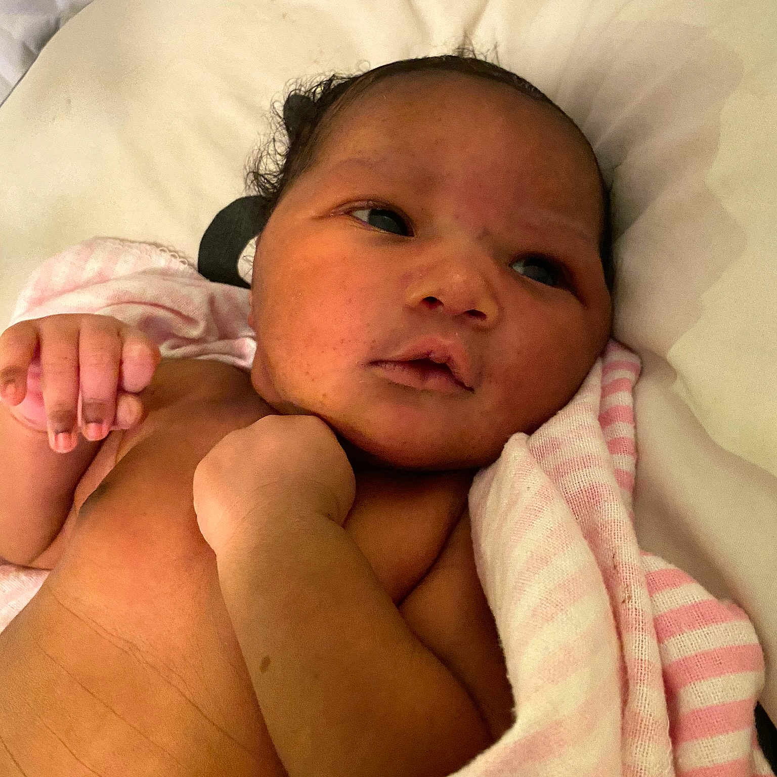 Queen is registered to the contest to win money with this photo: baby, bedtime, cheek, child, eye, eyebrow, face, finger, hand, head, linens, lip, mouth, muscle, nose, skin, toddler
