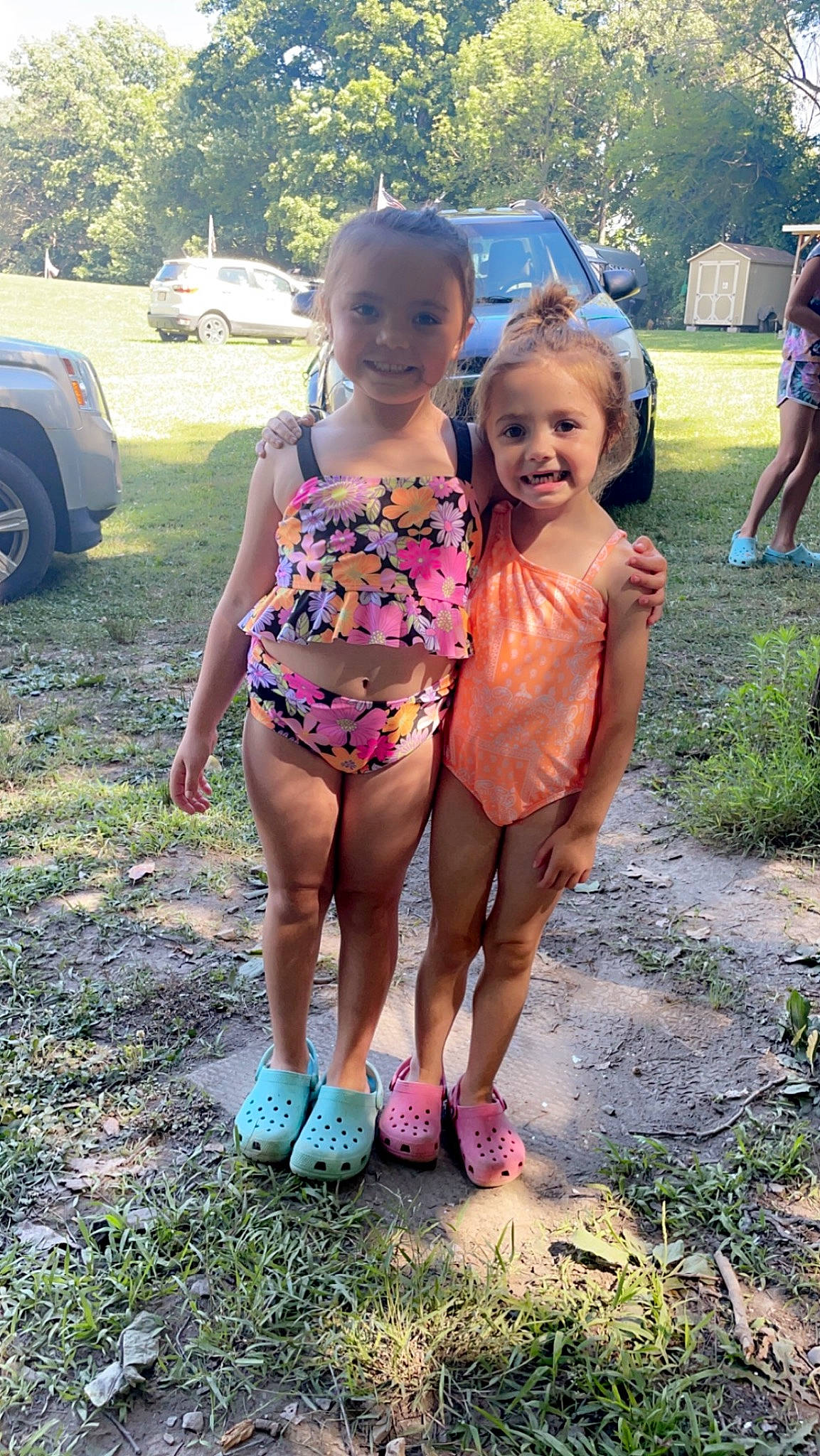 Kaelyn joined the competition — help win amazing prizes! child, event, fun, grass, happy, human_leg, joy, leisure, people_in_nature, person, pink, plant, public_space, recreation, sandal, smile, swimwear, thigh, tire, toddler