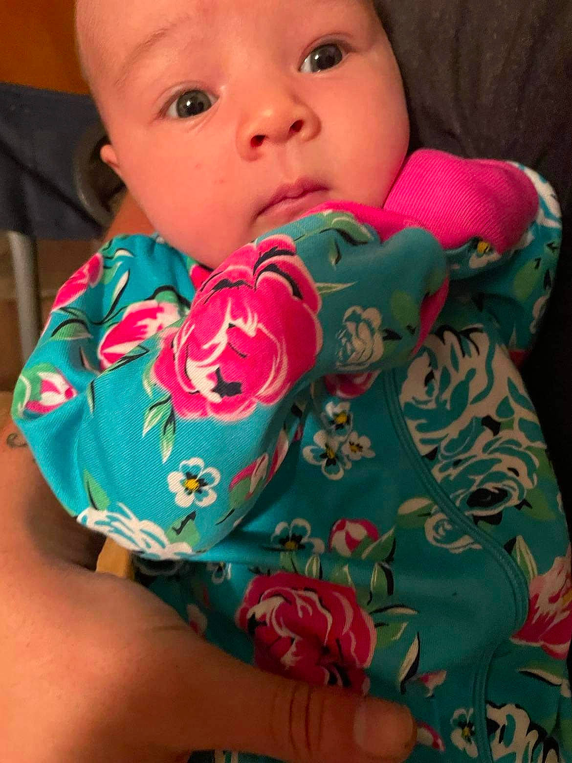 Lilliana is registered to the contest to win money with this photo: baby, baby_toddler_clothing, cheek, child, collar, comfort, drinkware, elbow, eyelash, finger, lip, nail, neck, nose, pattern, person, pink, skin, sleeve, t_shirt