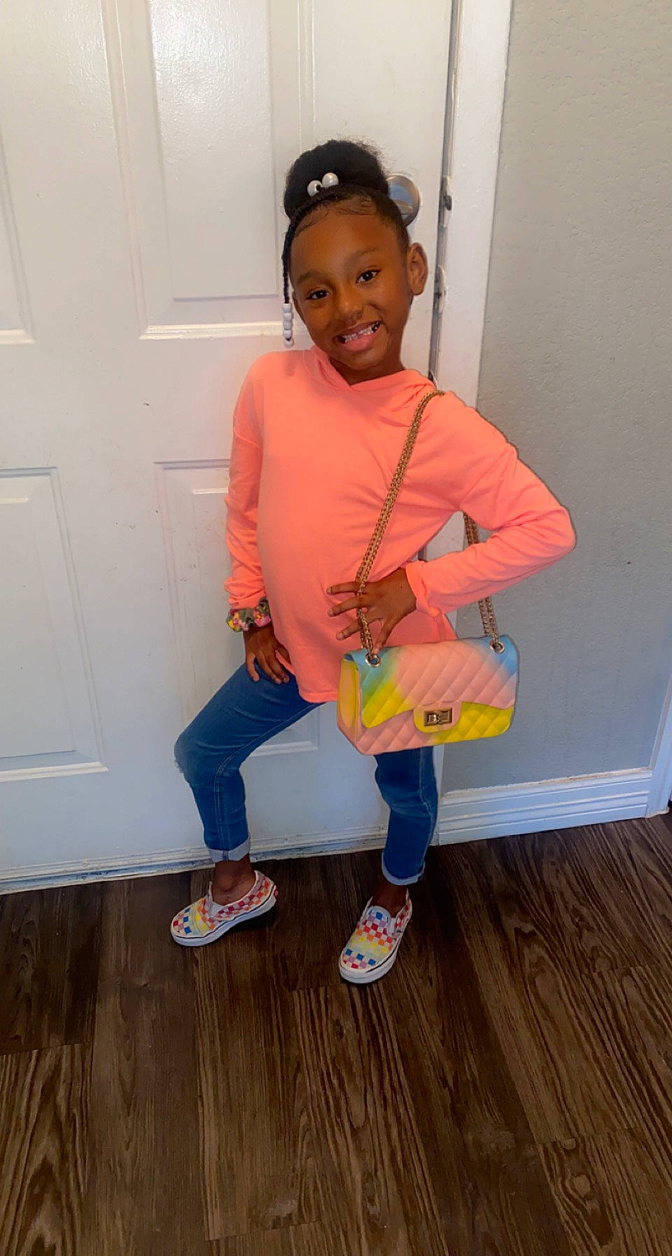 Aubreann is registered to the contest to win money with this photo: baby_toddler_clothing, door, dress, face, floor, flooring, footwear, happy, hardwood, head, joy, knee, leg, neck, person, shoe, sleeve, smile, sock, standing