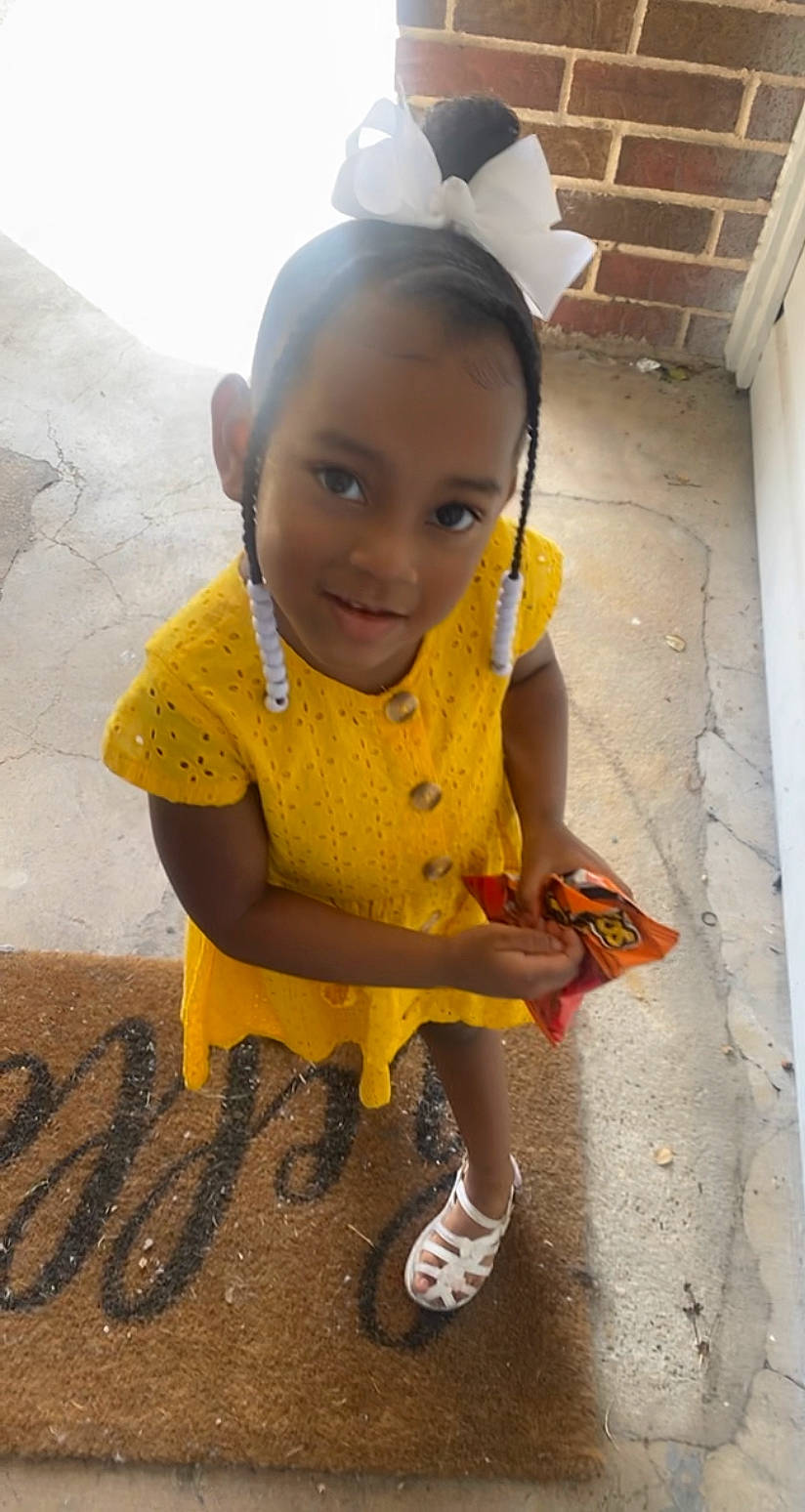 Alysia is registered to the contest to win money with this photo: audio_equipment, baby_toddler_clothing, child, costume, face, fashion_accessory, flooring, fun, hair_tie, happy, headband, jewellery, joy, leisure, pattern, person, personal_protective_equipment, sandal, smile, t_shirt