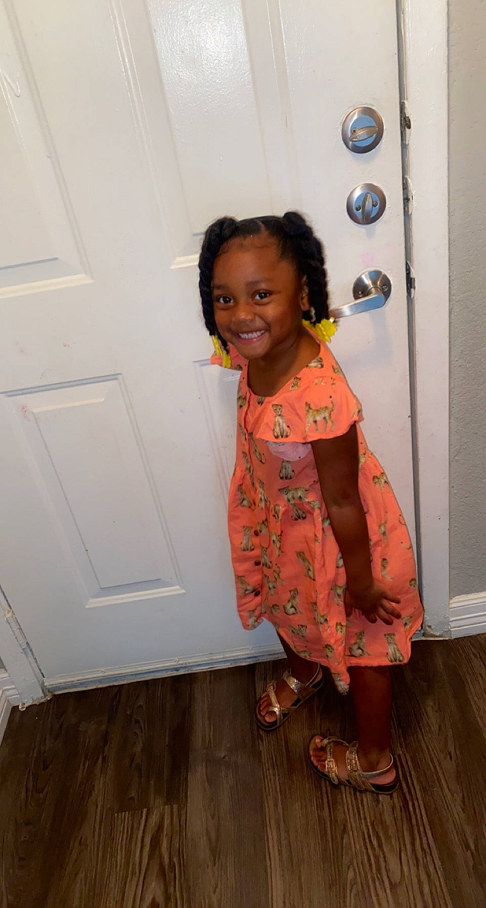 Armauni joined the competition — help win amazing prizes! baby_toddler_clothing, child, door, face, facial_expression, flip_flops, flooring, fun, hair, happy, hardwood, joy, person, room, skin, sleeve, smile, standing, toddler, varnish