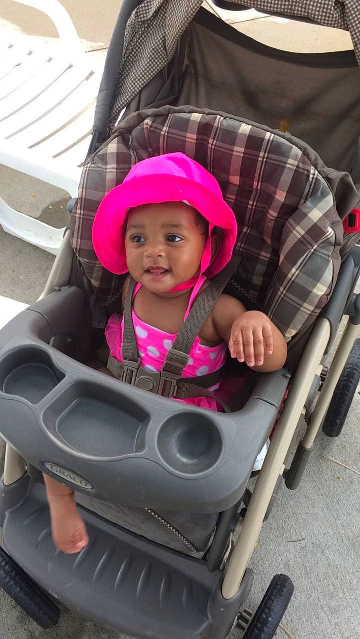 Armauni joined the competition — help win amazing prizes! auto_part, automotive_tire, baby, baby_carriage, baby_products, baby_safety, baby_toddler_clothing, car_seat, child, comfort, facial_expression, fun, headwear, magenta, motor_vehicle, person, product, sitting, tartan, tire