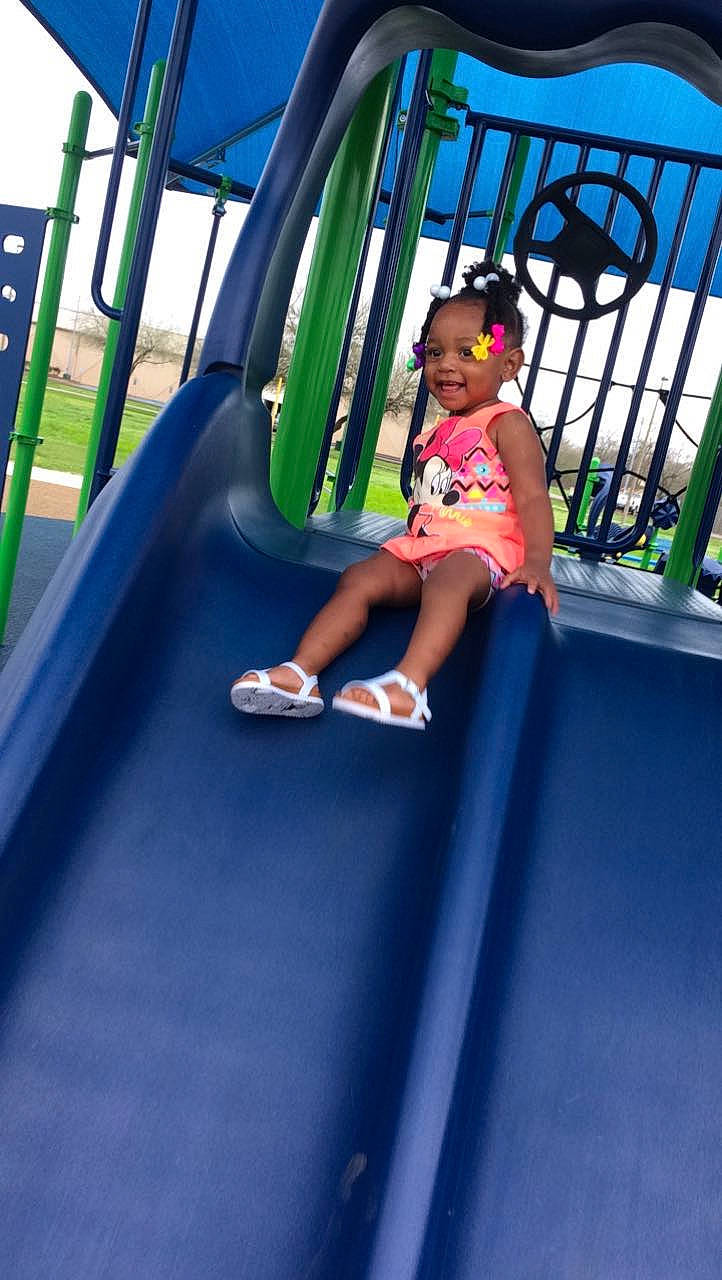 Armauni is registered to the contest to win money with this photo: child, chute, city, electric_blue, fun, joy, leisure, nonbuilding_structure, outdoor_play_equipment, outdoor_recreation, person, photograph, play, playground, playground_slide, recreation, shorts, sky, snapshot, t_shirt