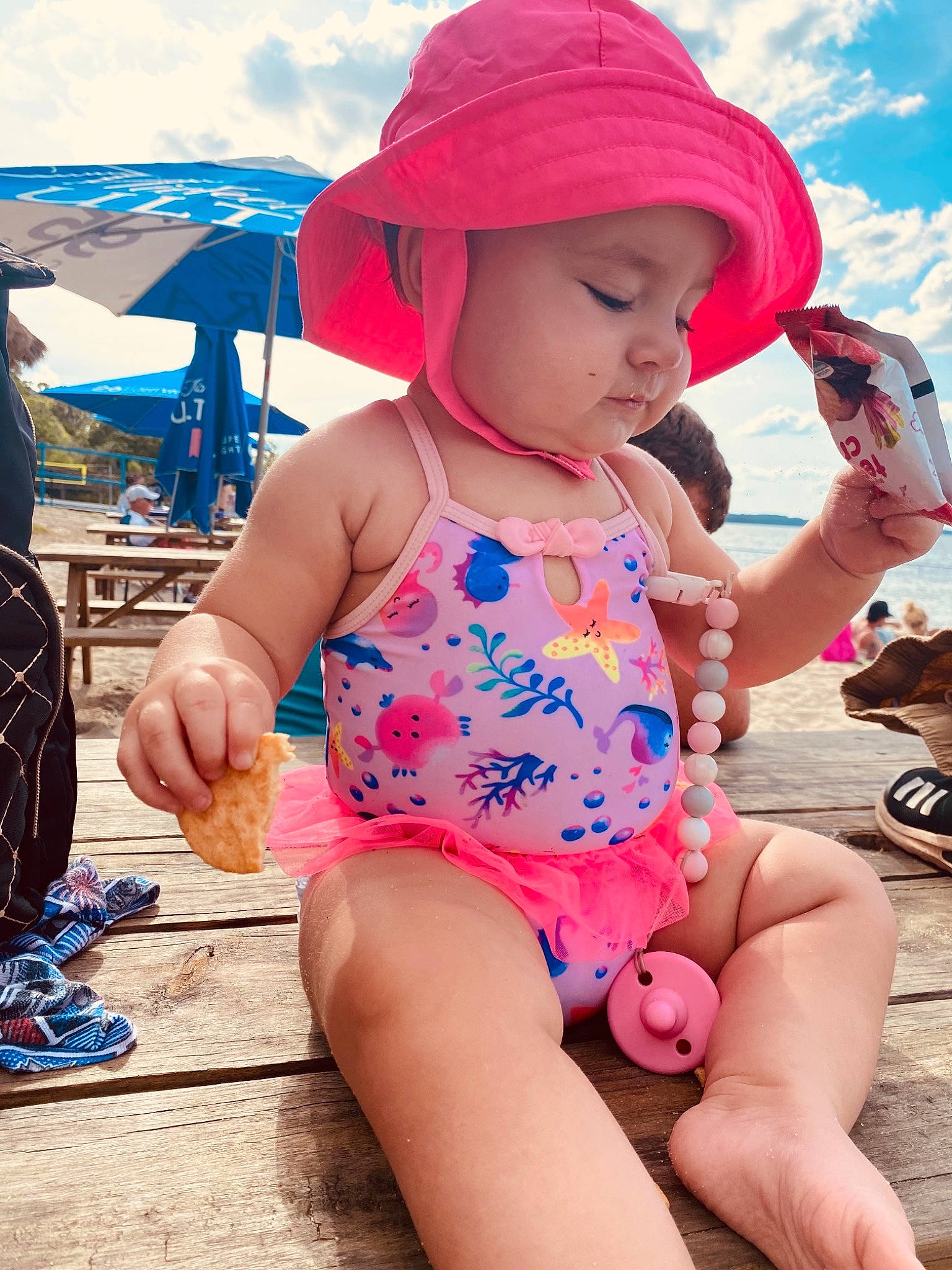 Kalaya is registered to the contest to win money with this photo: baby_toddler_clothing, beauty, blue, child, cloud, cool, fun, happy, hat, headgear, headwear, leg, leisure, person, pink, skin, sky, summer, sun_hat, swimwear