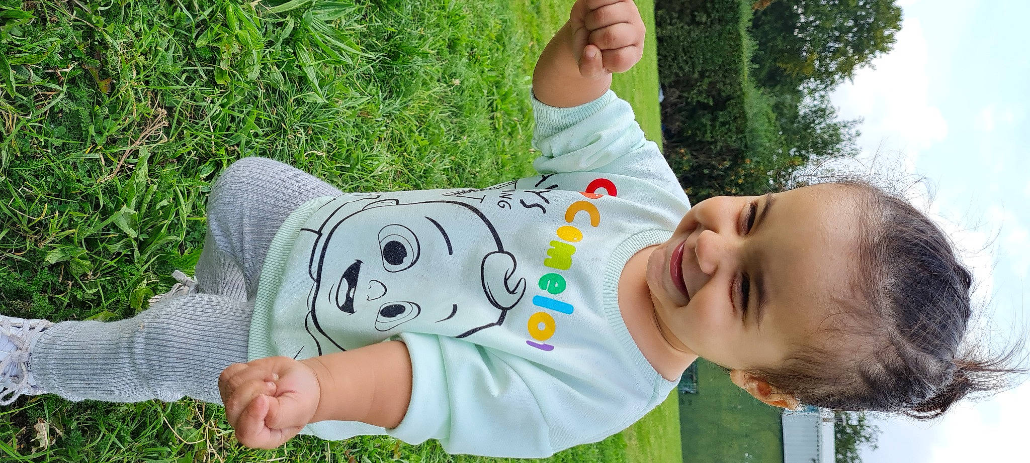 Camilla joined the competition — help win amazing prizes! arm, baby_toddler_clothing, clothing, fun, grass, grass_family, green, hand, happy, human_body, joy, leaf, leisure, mammal, person, plant, skin, sleeve, smile, t_shirt