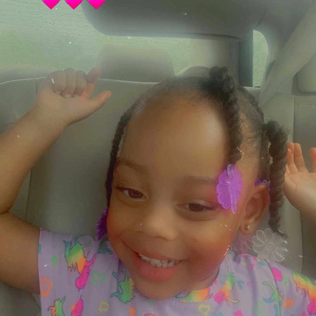 Macaiah is registered to the contest to win money with this photo: accessories, bodypart, child, clothing, cosmetics, cushion, face, female, girl, happy, head, homedecor, lipstick, person, photography, portrait, purple, selfie, smile, t_shirt