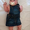 Ezya participe au concours pour gagner de l'argent avec cette photo : baby, infant, pacifier, denim_dress, headband, pink_clothing, footwear, lying_down, bed, white_bedspread, cute, child, portrait, fashion, sleepwear, toy, soft_toys, indoor, newborn, small