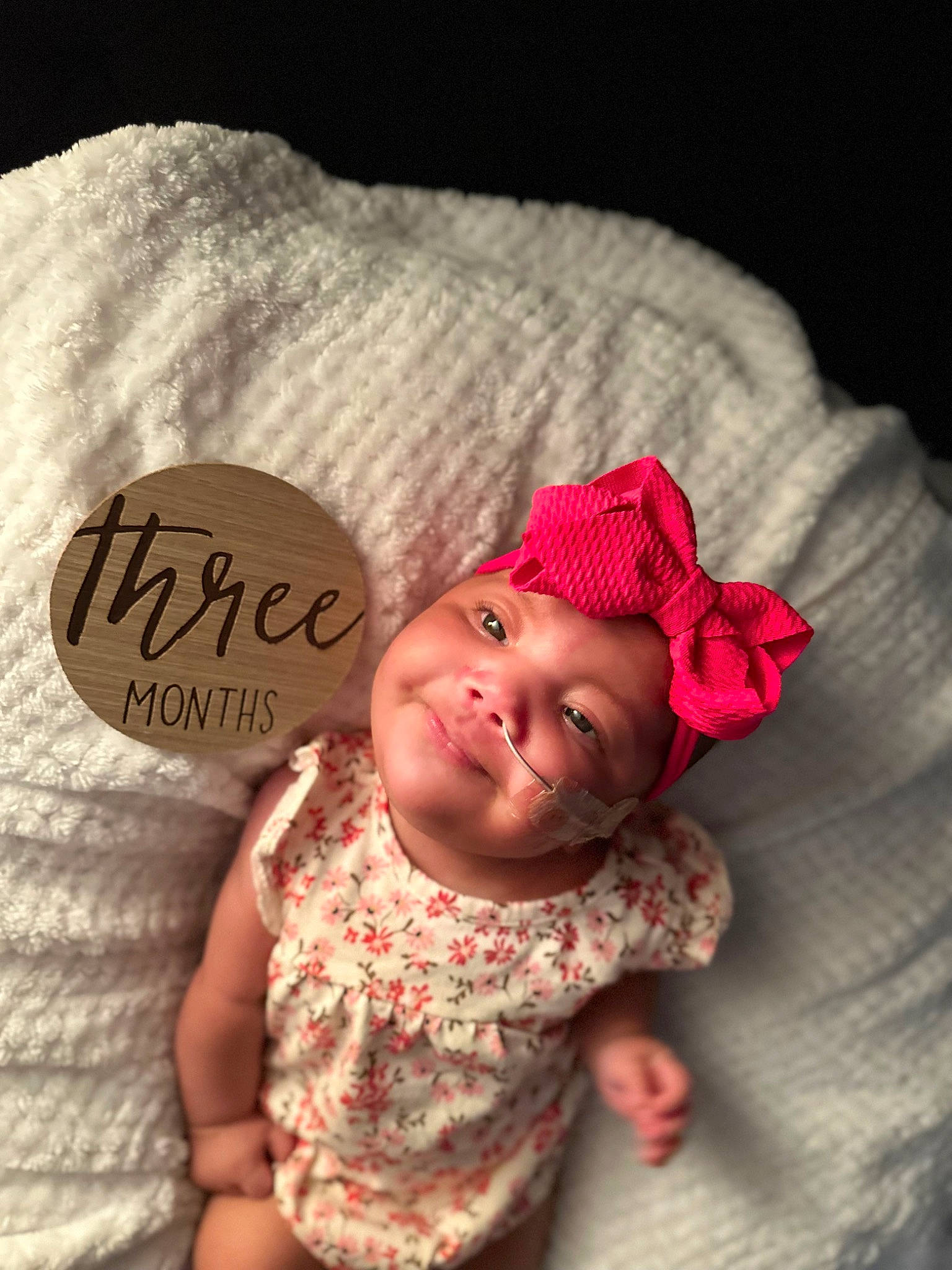 Ailani is registered to the contest to win money with this photo: baby, baby_toddler_clothing, cap, child, chin, face, fashion_accessory, finger, happy, head, headwear, linens, lip, magenta, pattern, person, pink, skin, smile, sweetness