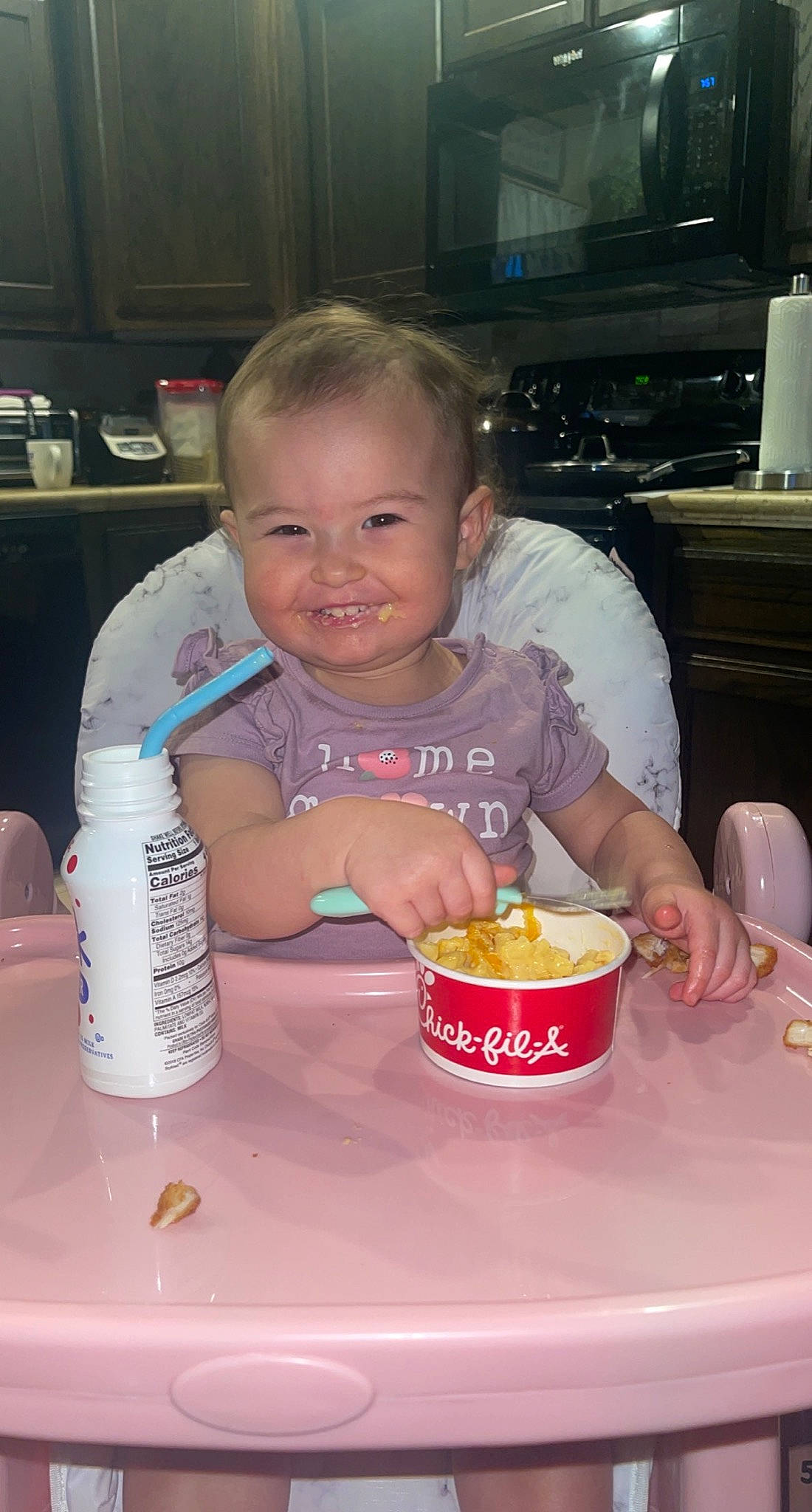 Karley joined the competition — help win amazing prizes! baby, bottle, chair, child, comfort_food, cuisine, dish, dishware, drink, drinkware, food, food_craving, joy, junk_food, person, plastic_bottle, plate, serveware, smile, table