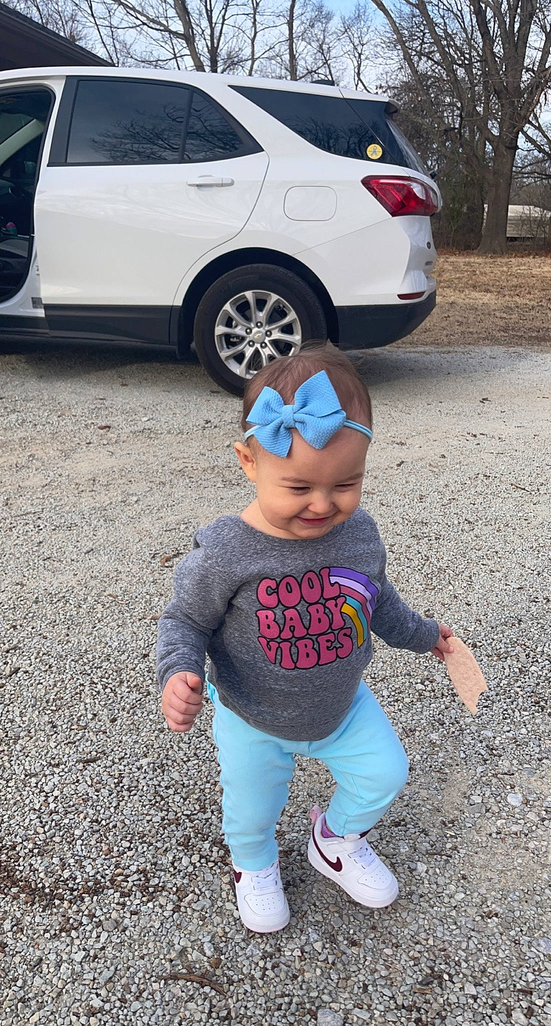 Karley is registered to the contest to win money with this photo: alloy_wheel, automotive_design, automotive_exterior, automotive_lighting, automotive_tire, black, bumper, car, fender, headwear, hood, hubcap, light, motor_vehicle, person, photograph, tire, vehicle, vehicle_door, vertebrate