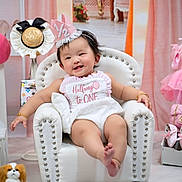 Blaire joined the competition — help win amazing prizes! baby, child, birthday, party_hat, armchair, pink, decorations, cake, toys, smiling, happy, clothing, shoes, plush_toy, celebration, indoor, festive, cute, infant, portrait