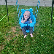 Joenah joined the competition — help win amazing prizes! baby, child, swing, playground, grass, outdoor, blue, seat, smile, happy, barefoot, clothing, park, daylight, nature, rope, fun, person, toddler, safety_strap