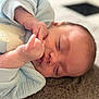 Lyam a rejoint le concours — aidez-le/la à gagner de superbes lots ! baby, sleeping, infant, closeup, cozy, soft, hands, face, peaceful, blue_clothing, heart, texture, rest, newborn, cute, portrait, child, nap, skin, indoors
