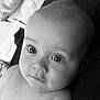 baby, infant, face, close_up, black_and_white, eyes, skin, portrait, child, cute, expression, young, head, person, human, soft, innocence, newborn, looking, curious