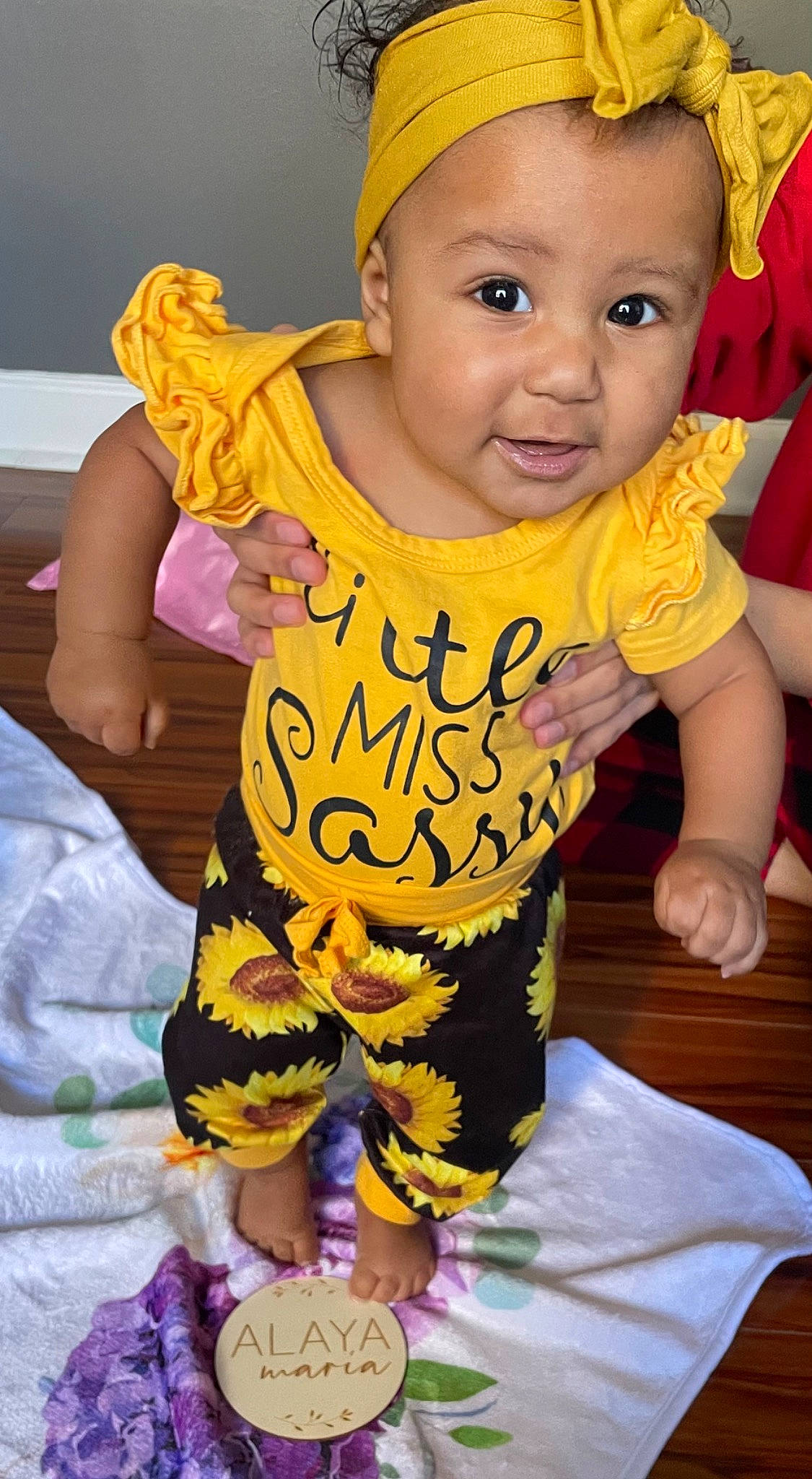 Alaya joined the competition — help win amazing prizes! baby, baby_toddler_clothing, cap, cheek, cool, facial_expression, finger, fun, gesture, hairstyle, happy, human, human_body, orange, person, pink, purple, skin, sleeve, toddler