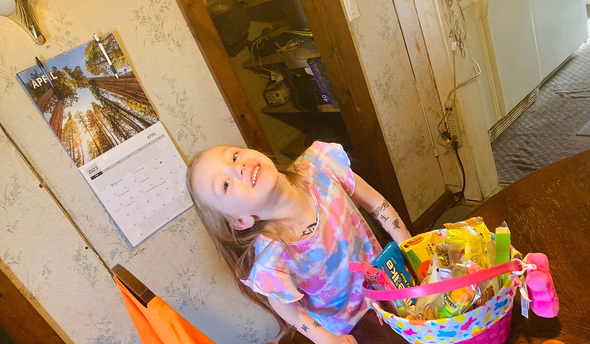 Harmony is registered to the contest to win money with this photo: child, door, event, fashion_design, fun, happy, joy, magenta, peach, person, plant, plastic, room, sitting, visual_arts, wood