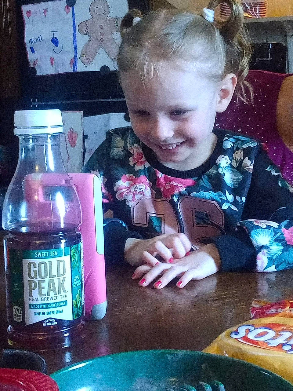 Katina is registered to the contest to win money with this photo: bottle, bottle_cap, child, drink, drinkware, electric_blue, event, fluid, gas, happy, joy, liquid, nail, person, pink, plastic_bottle, purple, smile, snapshot, solvent