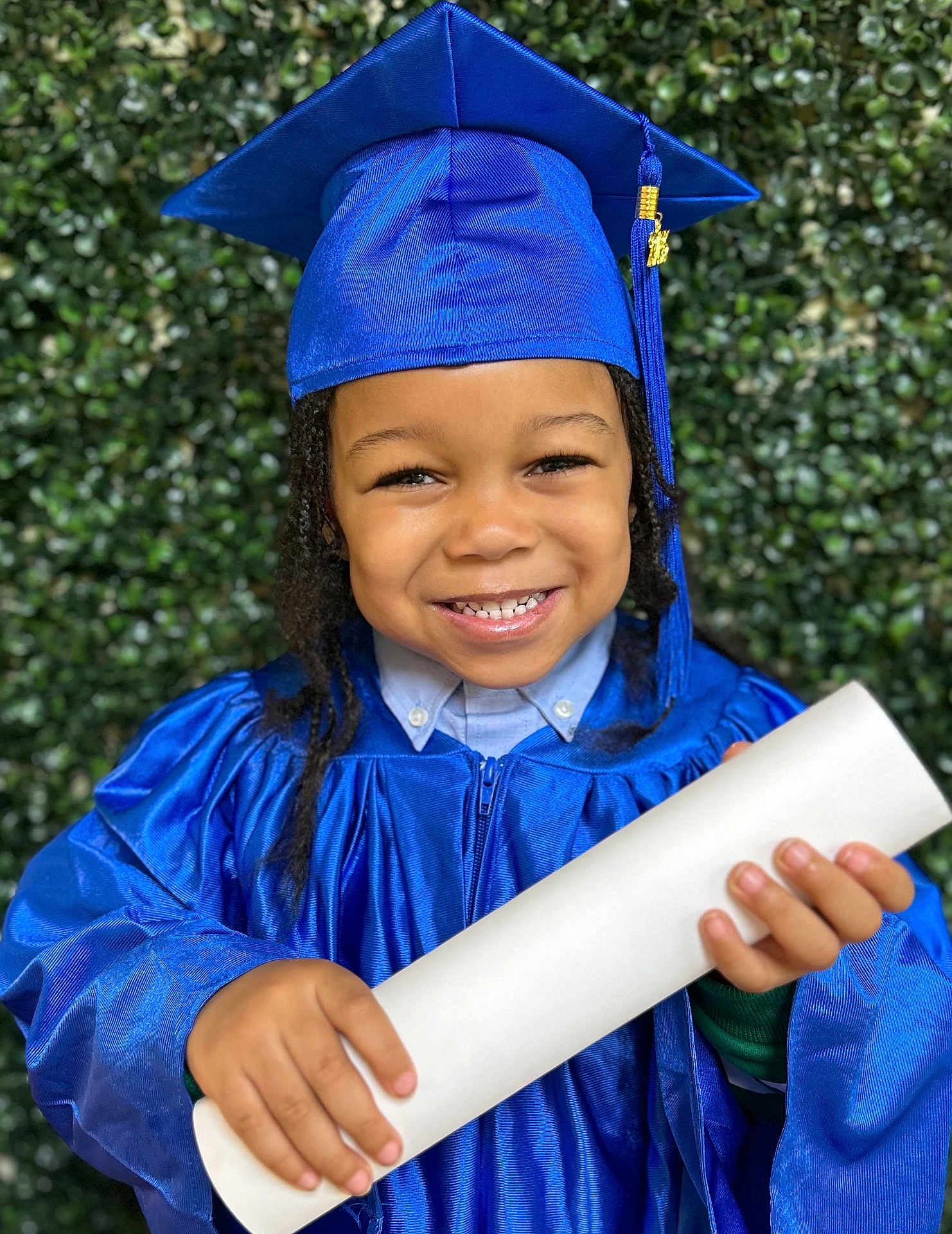 Noah joined the competition — help win amazing prizes! child, smiling, graduation, cap, gown, diploma, portrait, celebration, happy, young, education, achievement, outdoor, greenery, person, headwear, holding, blue, closeup, formal