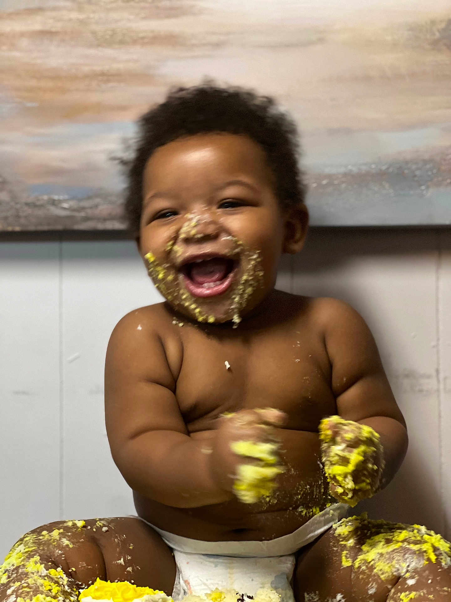 Namari is registered to the contest to win money with this photo: baby, child, diaper, cake, frosting, messy, happy, laughing, face, hands, sitting, indoor, cute, food, celebration, smile, chubby, young, playful, fun