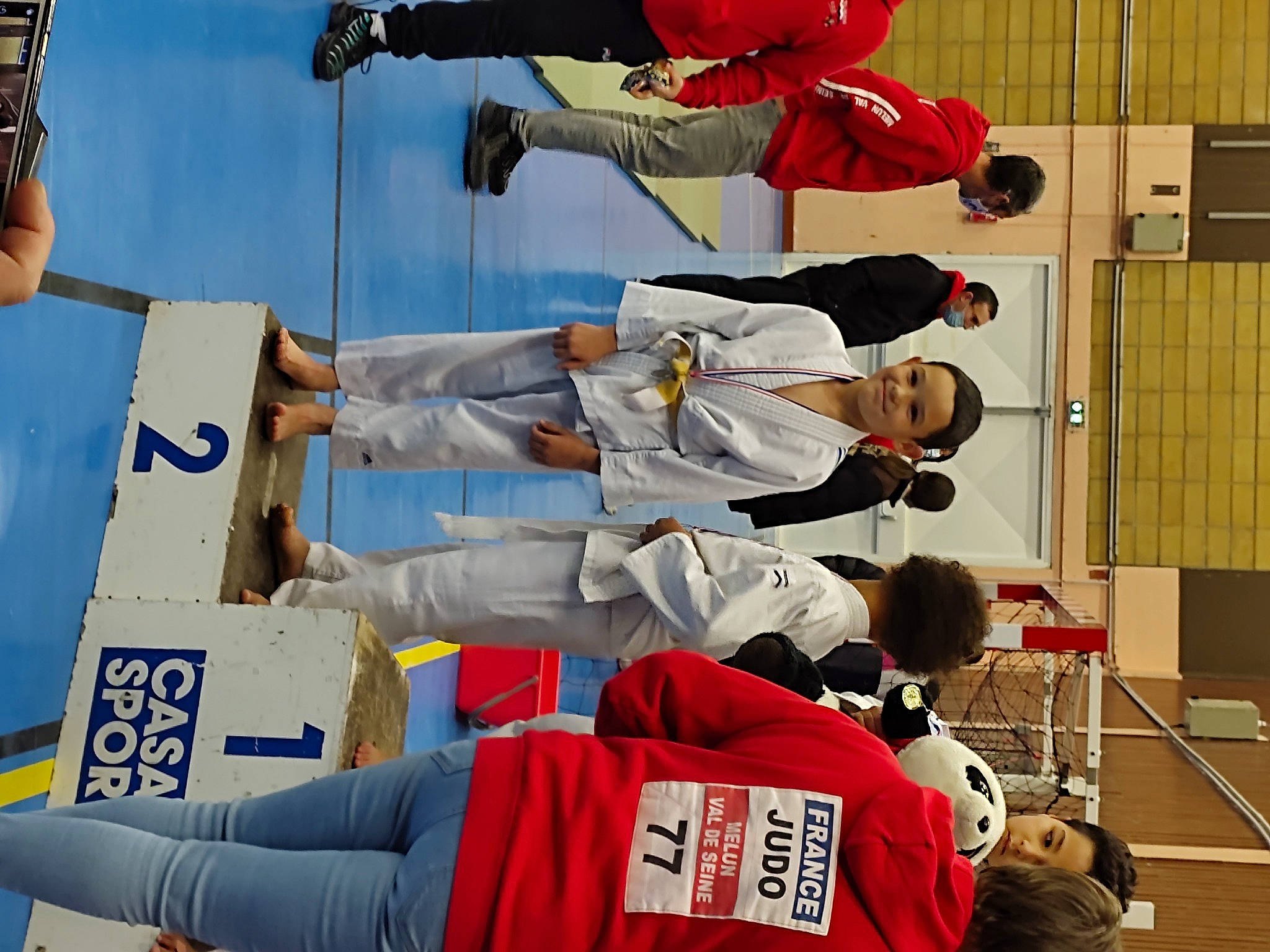 Nolan participe au concours pour gagner de l'argent avec cette photo : carmine, championship, competition, competition_event, engineering, event, glove, hat, headwear, joy, machine, person, recreation, room, shorts, smile, sports_uniform, t_shirt, team, uniform