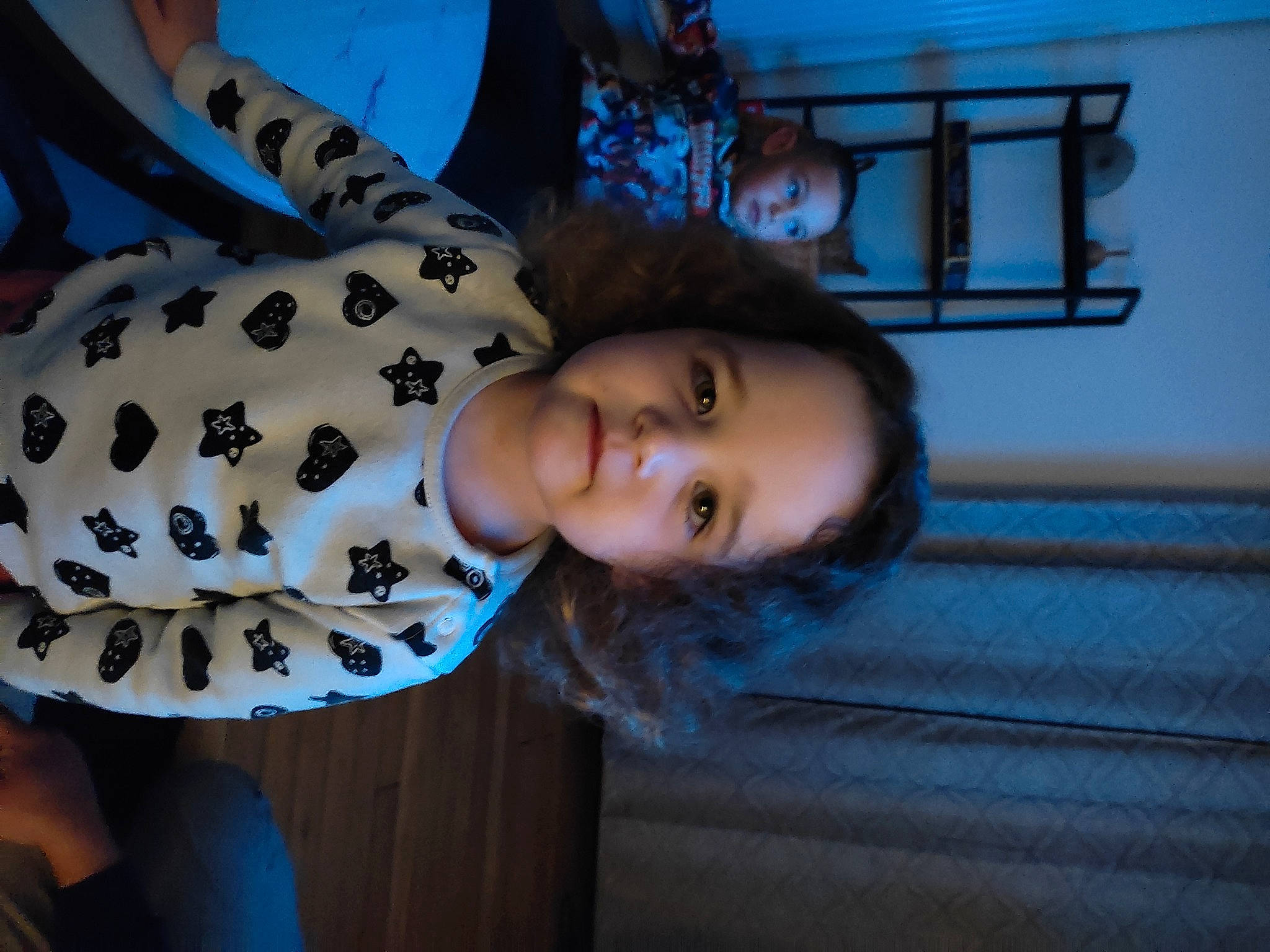 Noélia a rejoint le concours — aidez-le/la à gagner de superbes lots ! cheek, child, electric_blue, flash_photography, fun, fur, happy, pattern, person, room, sitting, toddler, wood