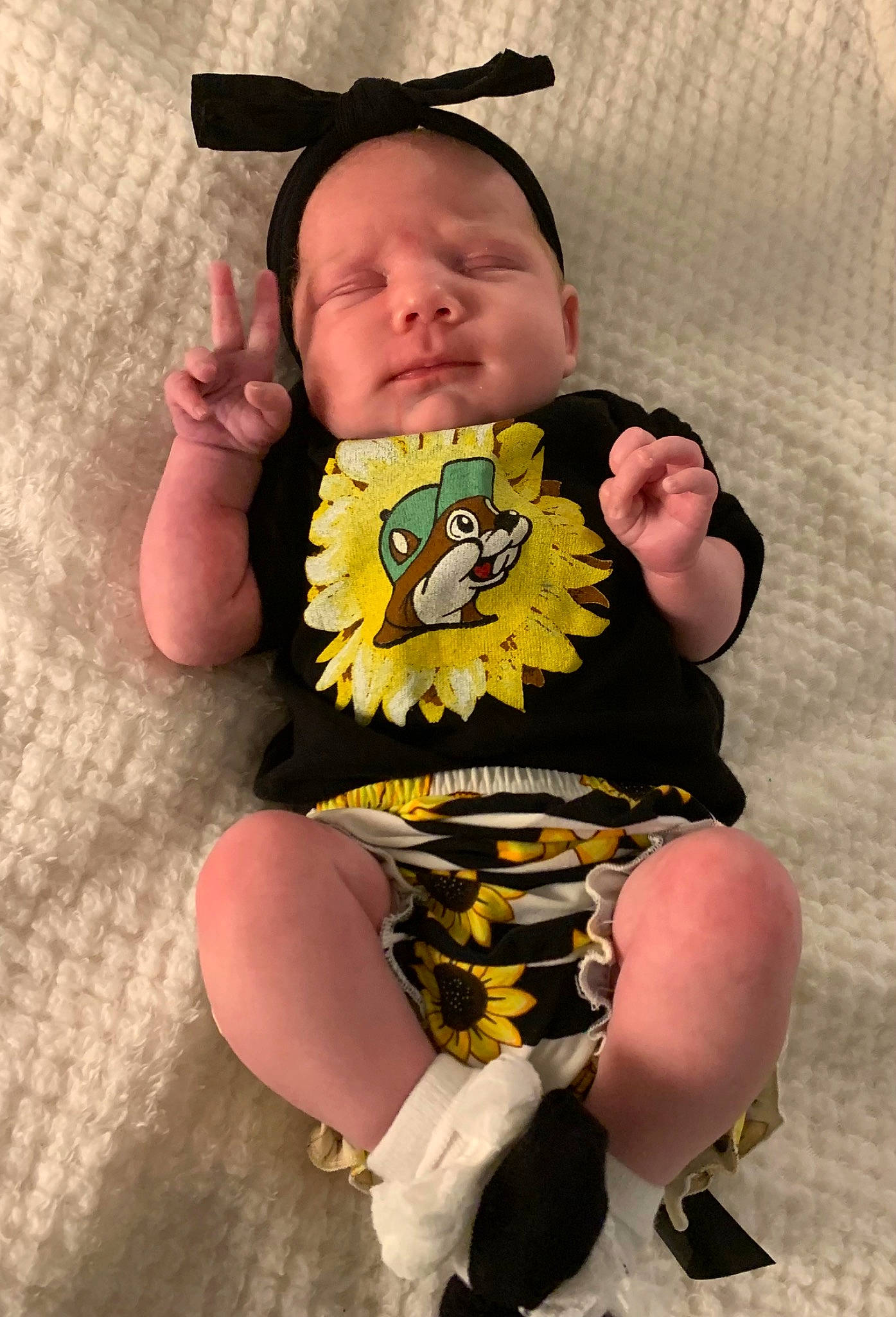 Ayda is registered to the contest to win money with this photo: abdomen, baby, baby_products, baby_sleeping, baby_toddler_clothing, chair, child, comfort, drinkware, eye, face, happy, human_leg, person, personal_protective_equipment, sitting, skin, sleeve, t_shirt, thigh